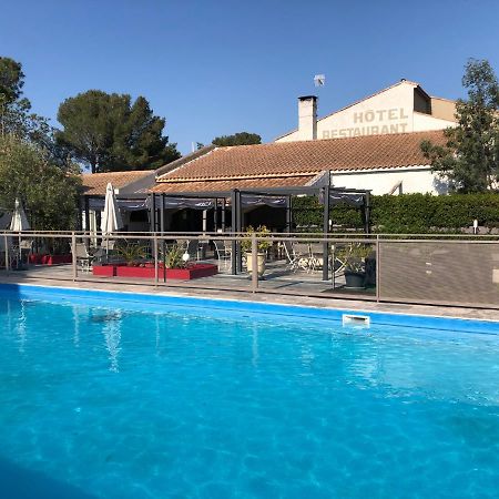 Logis Hotel Restaurant Les Aubuns Caissargues Exterior foto