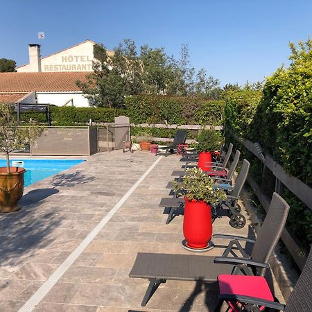 Logis Hotel Restaurant Les Aubuns Caissargues Exterior foto