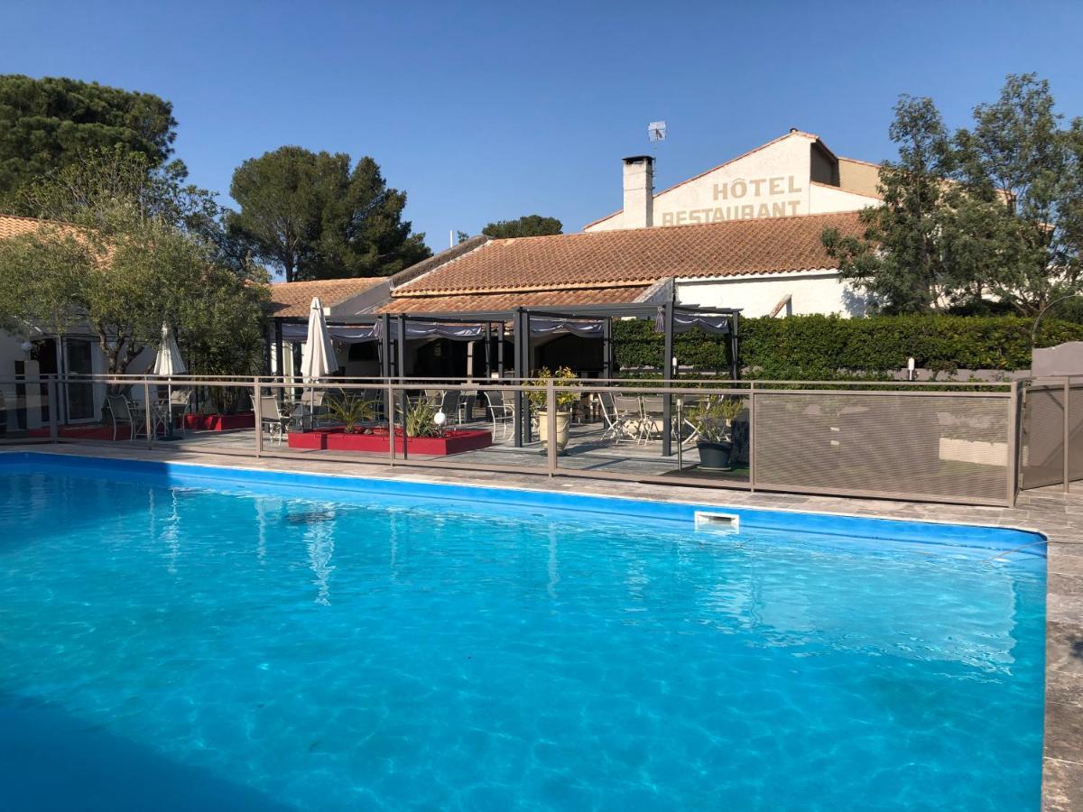 Logis Hotel Restaurant Les Aubuns Caissargues Exterior foto