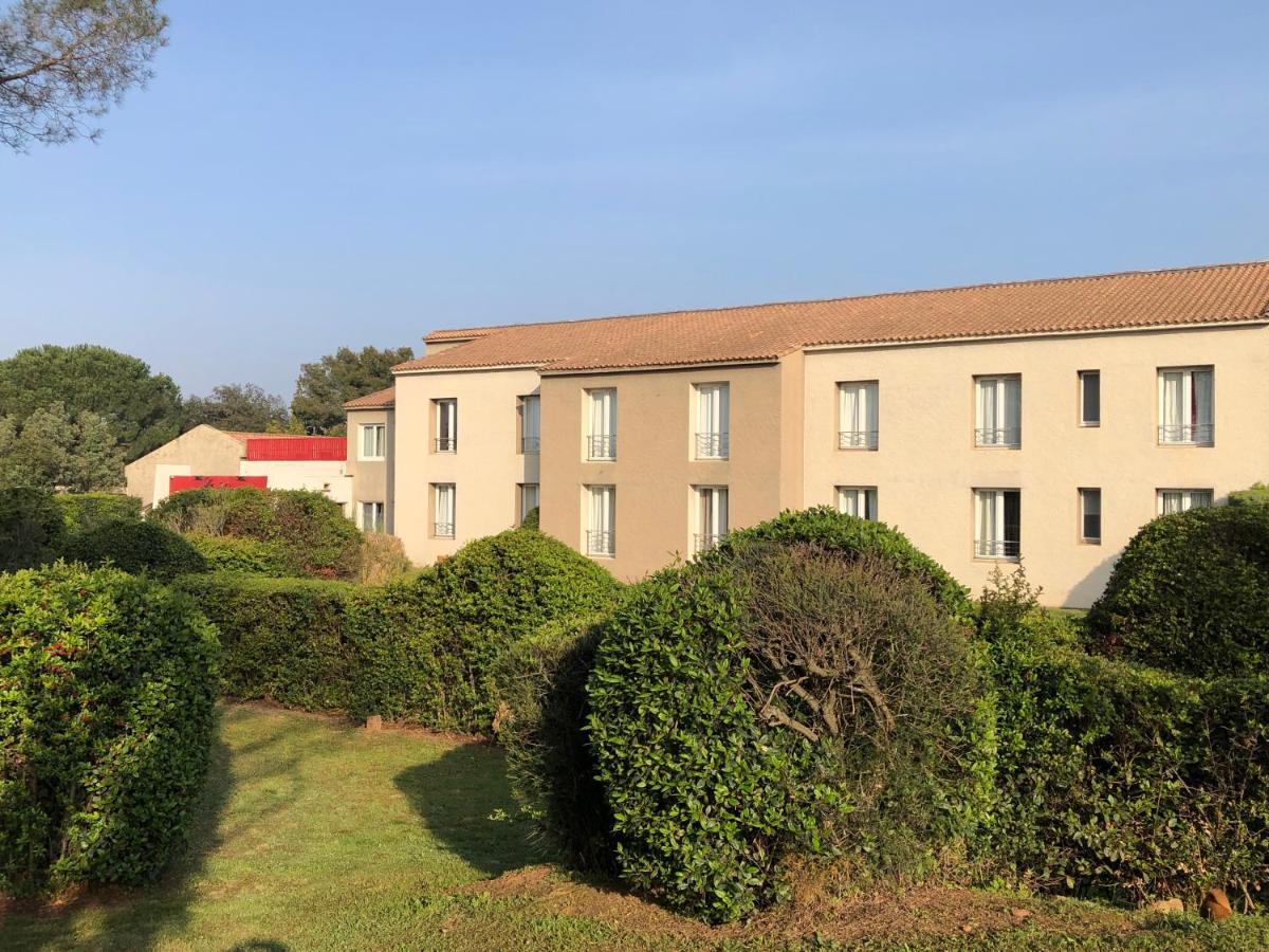 Logis Hotel Restaurant Les Aubuns Caissargues Exterior foto