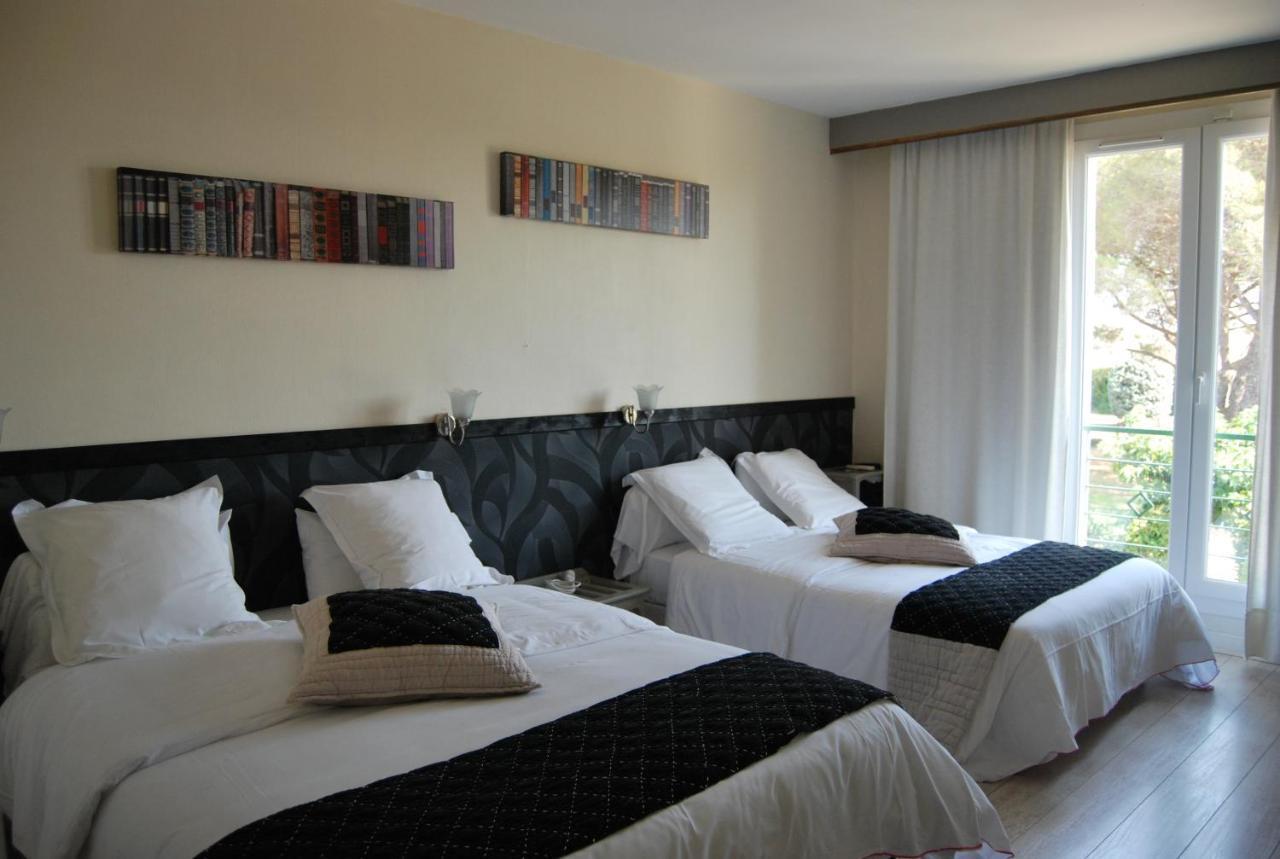 Logis Hotel Restaurant Les Aubuns Caissargues Quarto foto